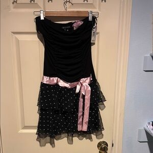 Elegant Black Dress with Pink Polka Dots
